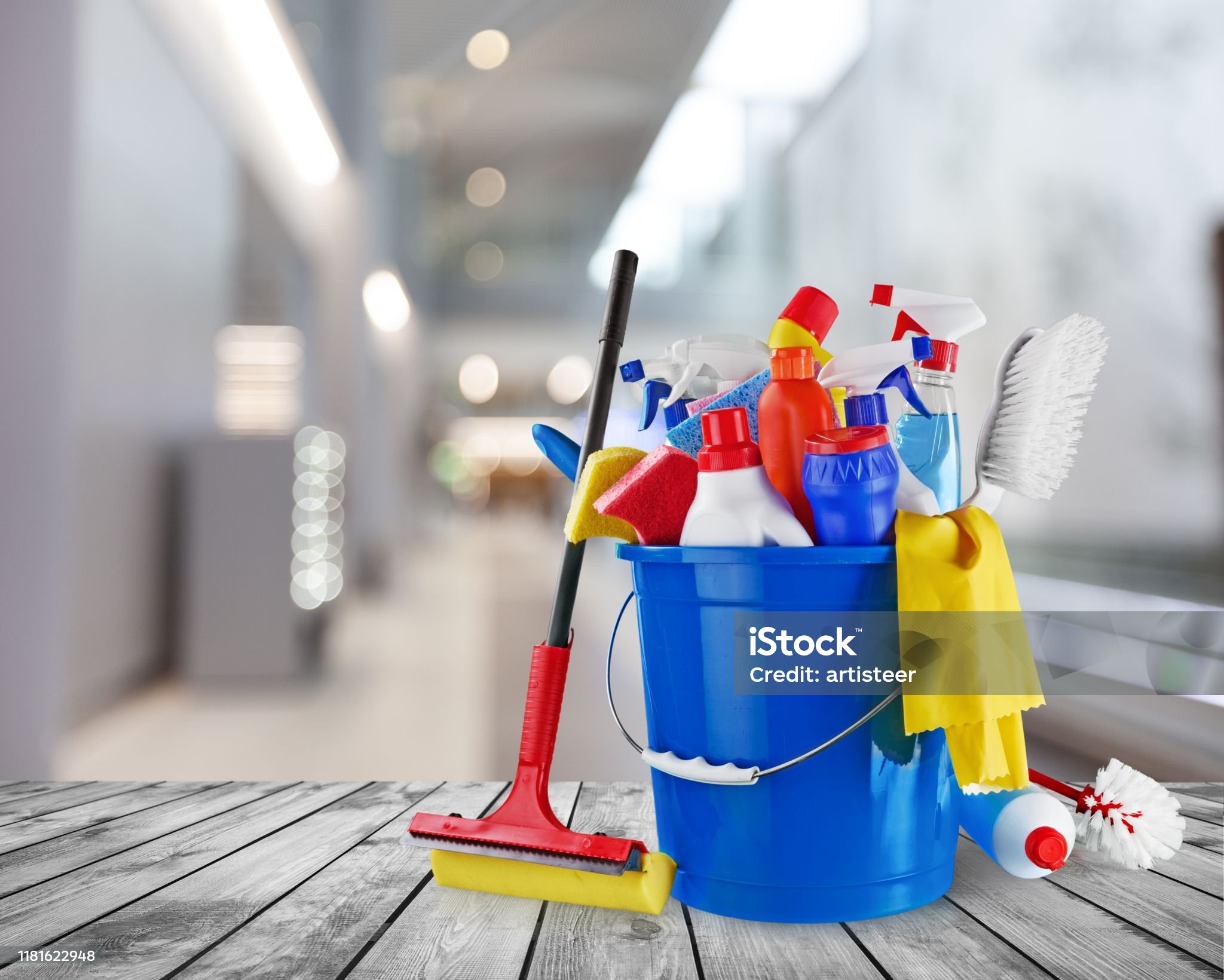 Plastic bottles, cleaning sponge and gloves  on background